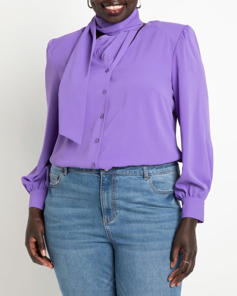 Front of a model wearing a size 14 Rory Button Front Blouse in Dahlia Purple by ELOQUII. | dia_product_style_image_id:241924